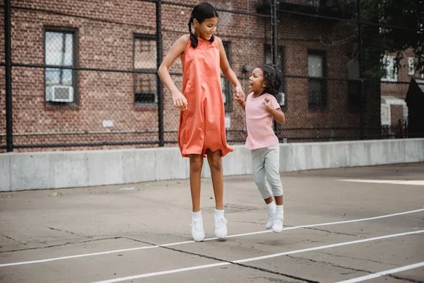 Mother and daughter walking together