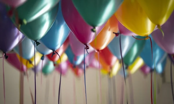 Colorful confetti and balloons at a celebration